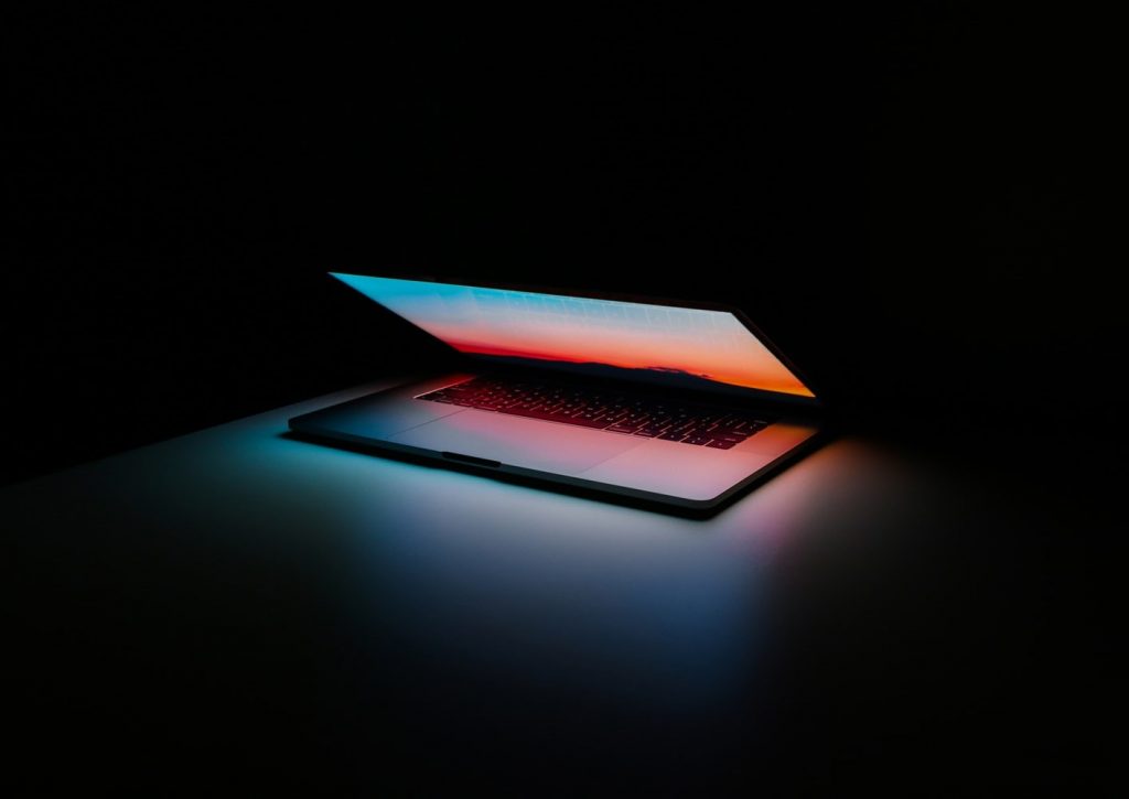 A partially open laptop.