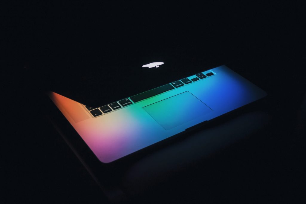 A half-opened MacBook. 